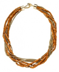 Sunset inspiration. Rich orange hues create the perfect summer vibe on Michael Kors' multi-strand necklace. Set in gold tone mixed metal with semi-precious dyed howlite. Approximate length: 17 inches.