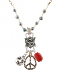 Give peace a chance. Lucky Brand recalls 1960s style with this peace sign-themed charm necklace. Adorned with white jade and freshwater pearls, it's set in both gold tone and silver tone mixed metal. Approximate length: 21 inches + 2-inch extender. Approximate drop: 2-4/10 inches.